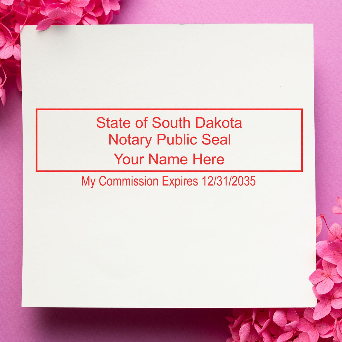 An alternative view of the Slim Pre-Inked Rectangular Notary Stamp for South Dakota stamped on a sheet of paper showing the image in use