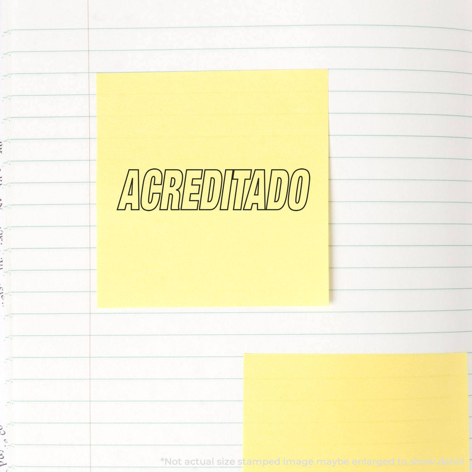 Large Self Inking Acreditado Stamp used on a yellow sticky note placed on a lined notebook page.