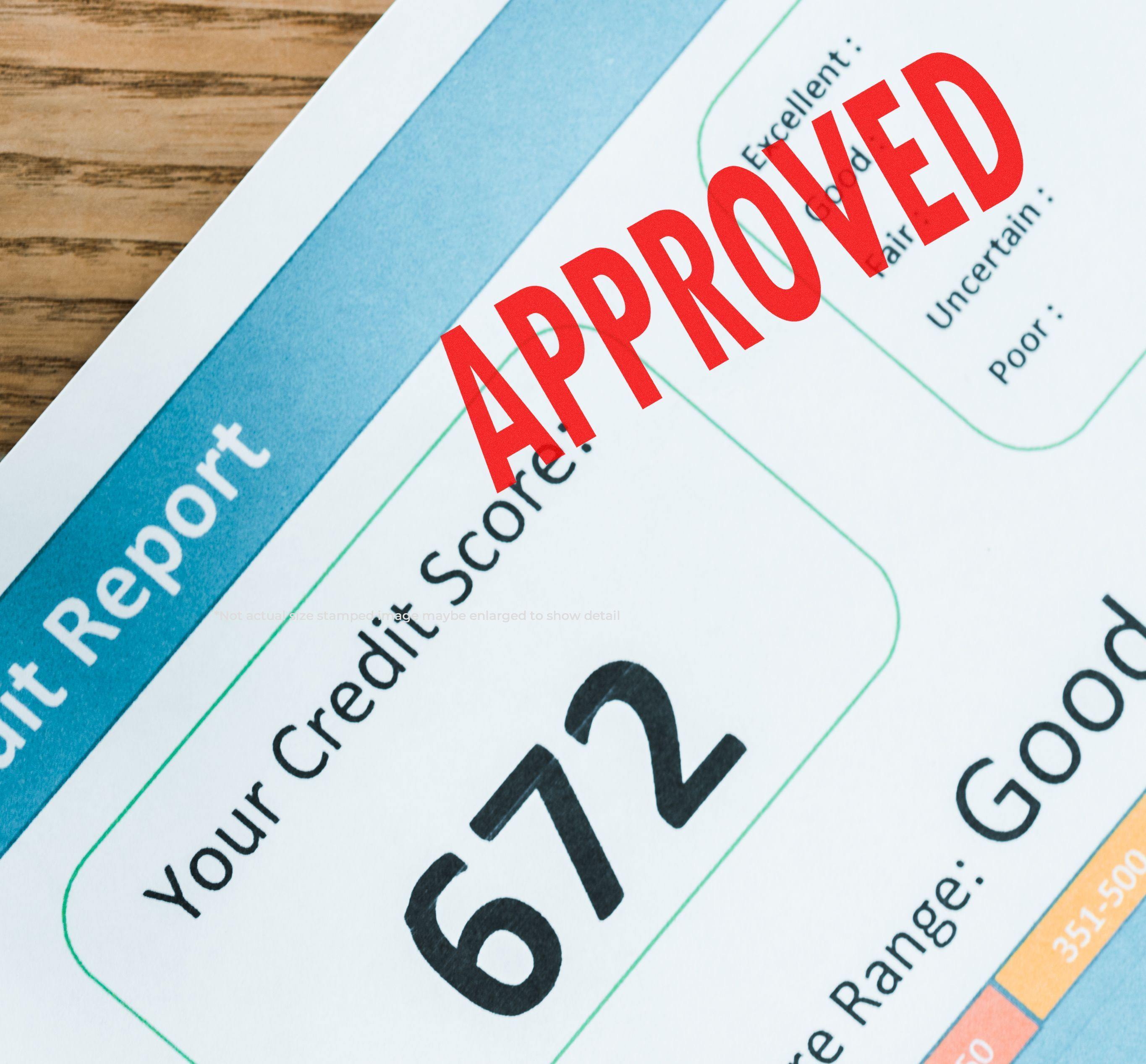 Slim Pre-Inked Approved Stamp marking a credit report with a score of 672 and the word APPROVED in red.