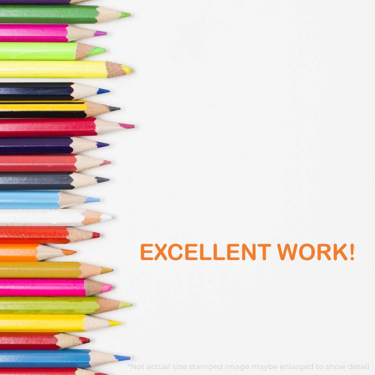 Colorful pencils on the left with EXCELLENT WORK! stamped in orange on the right using the Large Pre-Inked Excellent Work Stamp.
