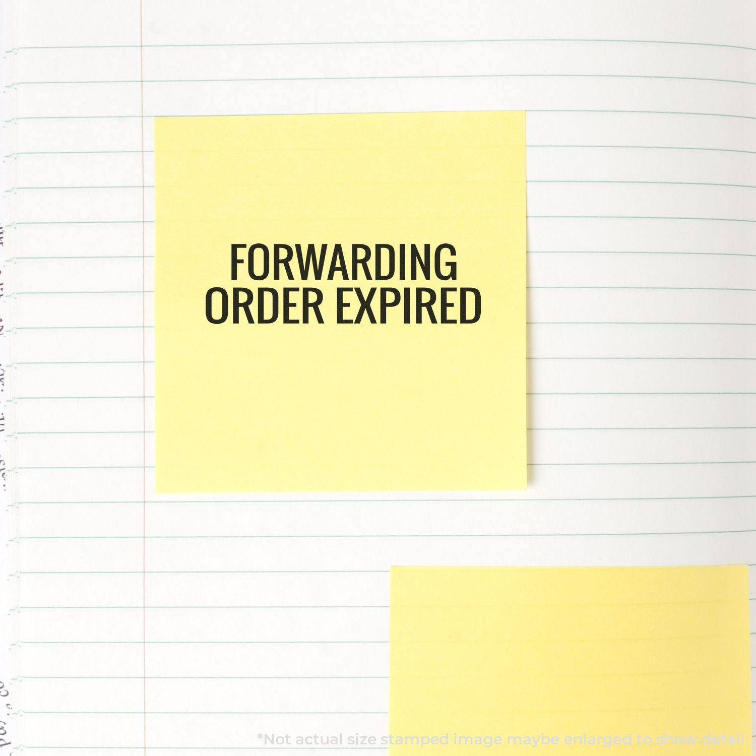 Large Pre-Inked Forwarding Order Expiring Stamp used on a yellow sticky note, placed on a lined notebook page.