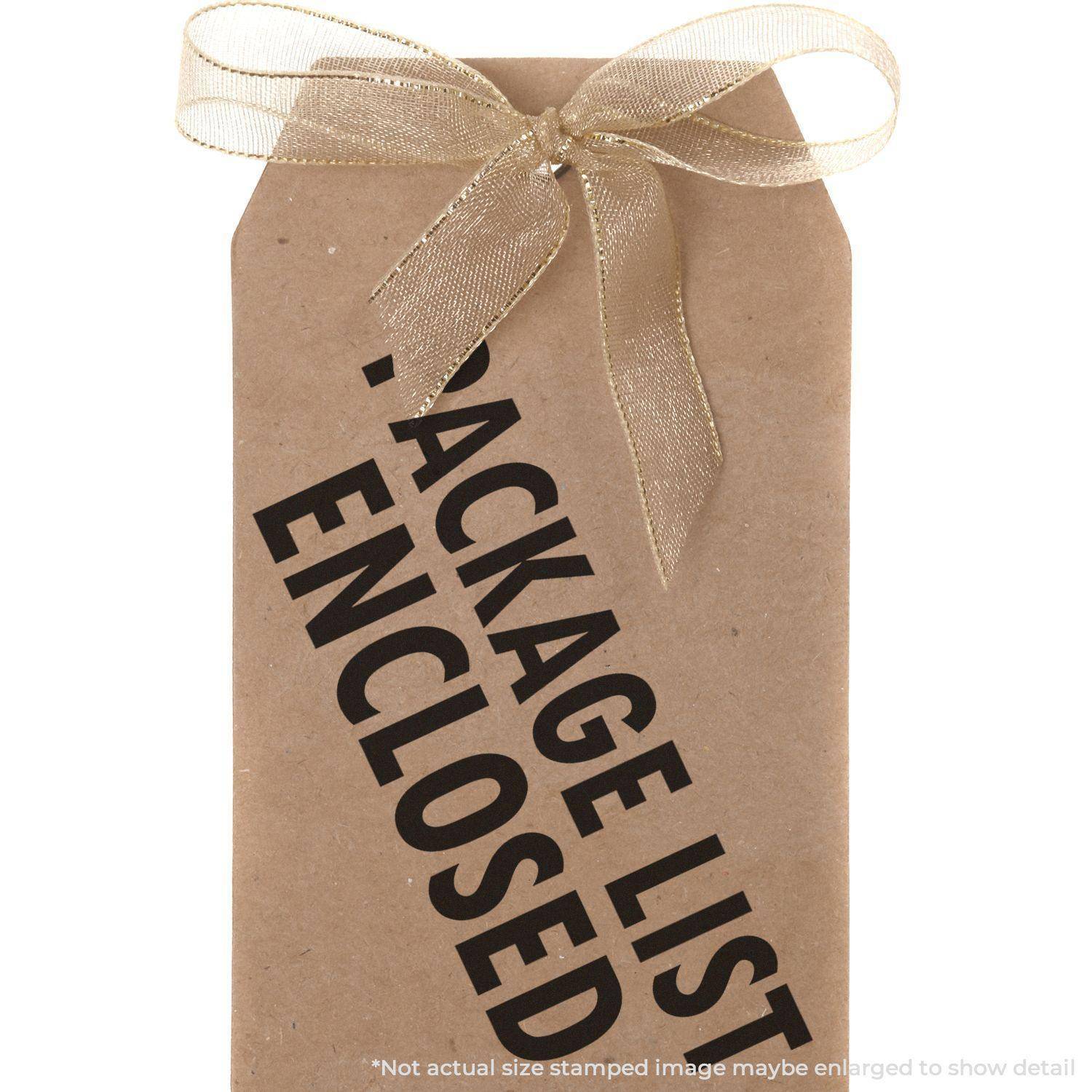 A brown package with a gold ribbon bow stamped with PACKAGE LIST ENCLOSED using the Large Pre-Inked Package List Enclosed Stamp.