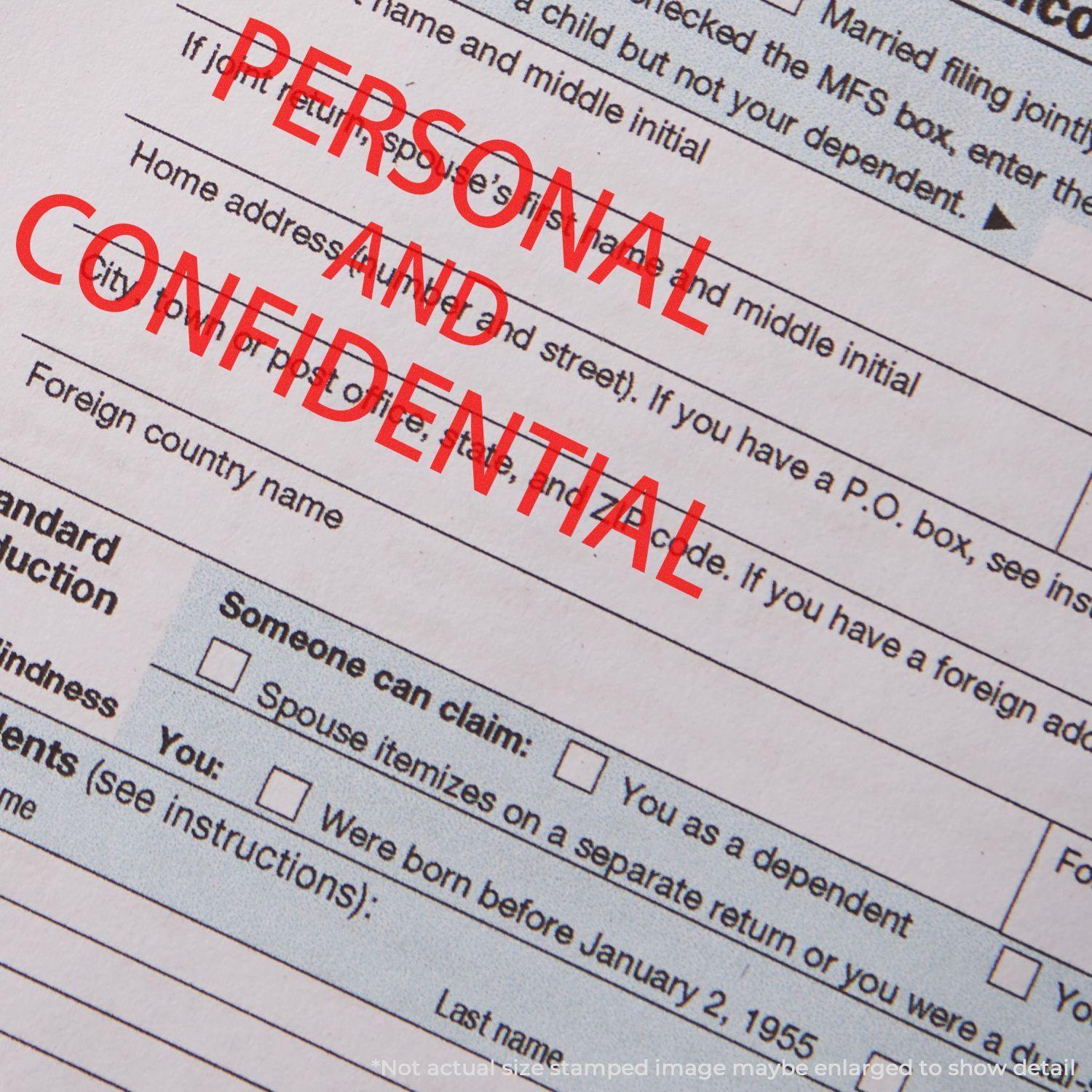 A stock office rubber stamp with a stamped image showing how the text "PERSONAL AND CONFIDENTIAL" in a large font is displayed after stamping.