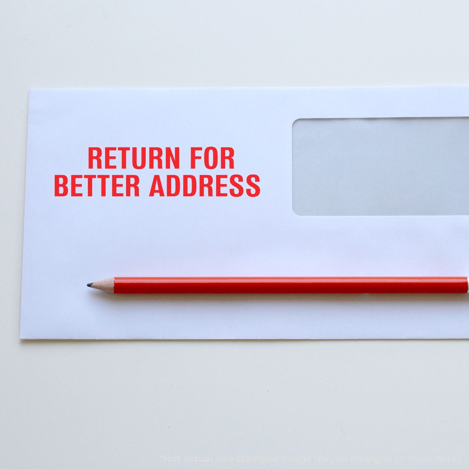 Envelope stamped with RETURN FOR BETTER ADDRESS in red ink using the Self Inking Return for Better Address Stamp, with a red pencil beside it.