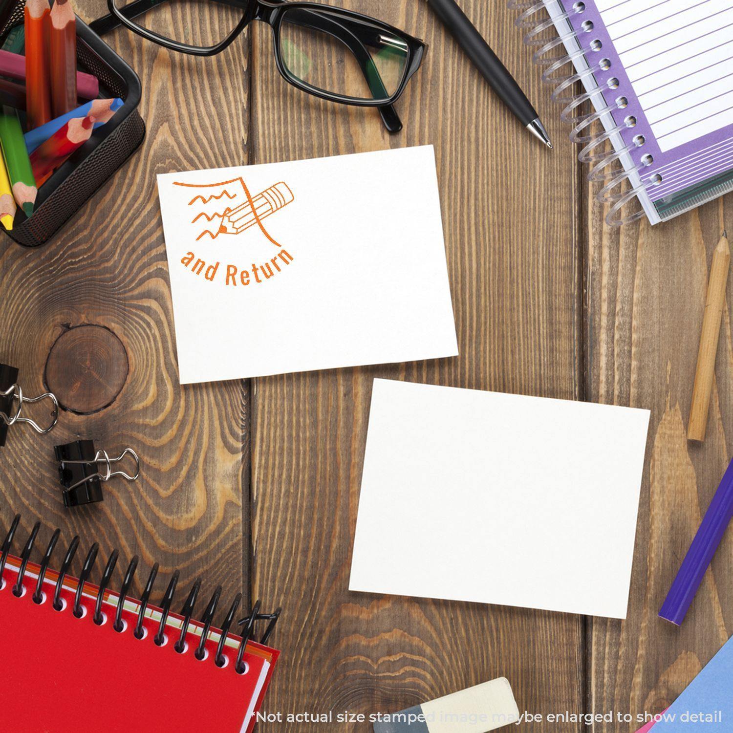 Desk with stationery, glasses, and two cards, one stamped with a Round Sign and Return Rubber Stamp in orange ink.