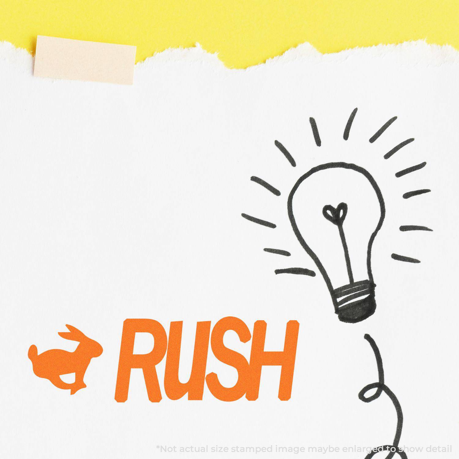 Large Rush with Rabbit Rubber Stamp in orange ink on white paper, next to a hand-drawn light bulb, against a yellow background.