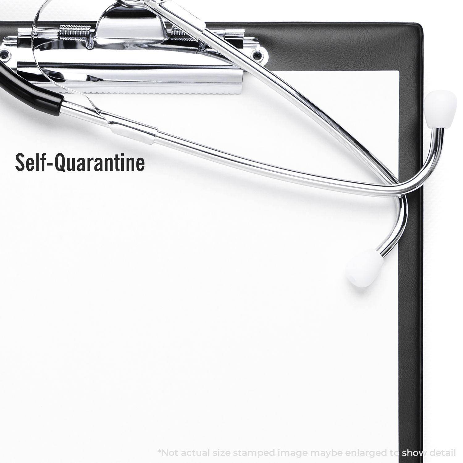 Clipboard with stethoscope and Large Pre-Inked Self-Quarantine Stamp marking Self-Quarantine on a blank sheet of paper.