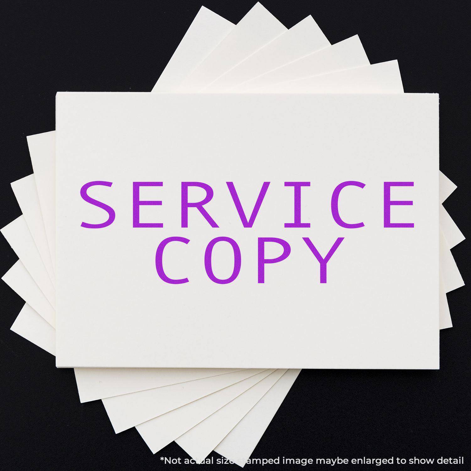 Large Pre-Inked Service Copy Stamp in use, displaying SERVICE COPY in purple on white paper against a black background.
