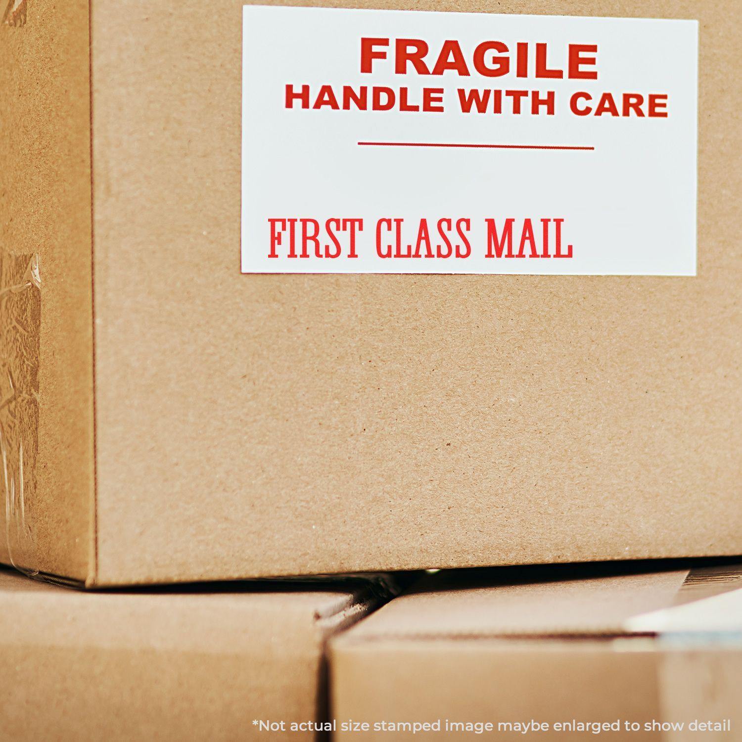 Large Times First Class Mail Rubber Stamp on a cardboard box with a label reading 'FRAGILE HANDLE WITH CARE FIRST CLASS MAIL.'