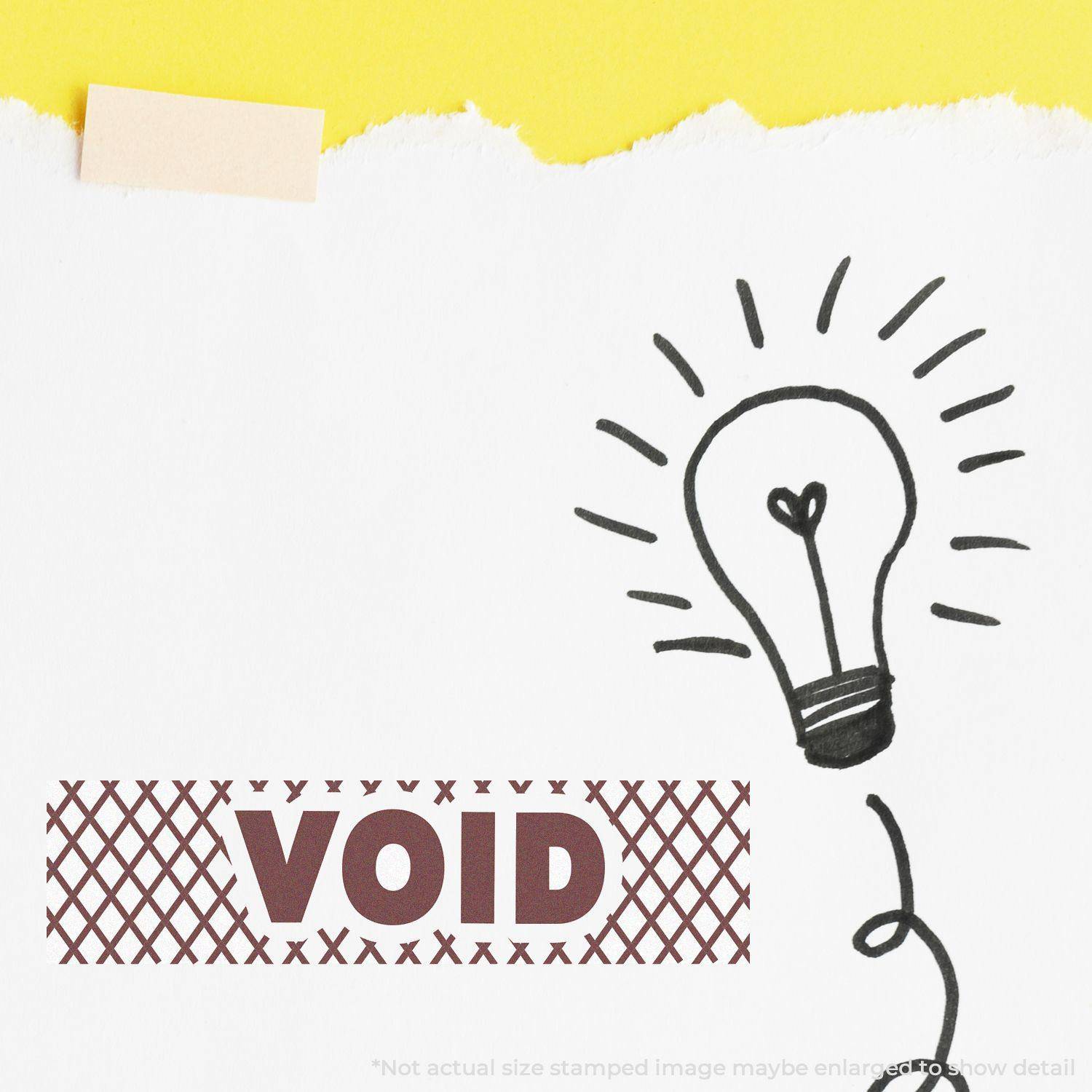 Image of a Large Pre-Inked Void with Strikelines Stamp marking VOID on paper with a hand-drawn lightbulb sketch beside it.
