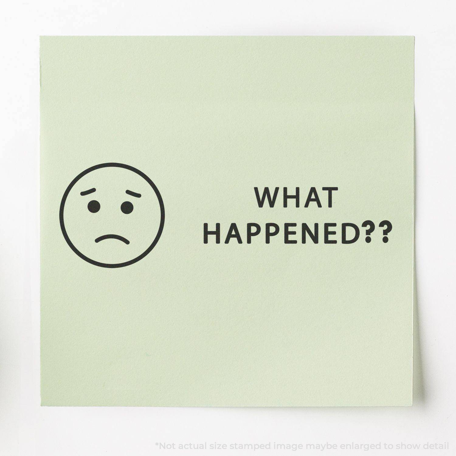 A stamped image on a green paper with a sad face and the text WHAT HAPPENED?? using the Large Pre-Inked What Happened Stamp.