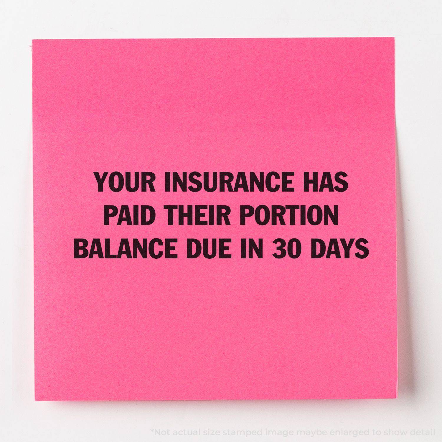 Pink paper stamped with YOUR INSURANCE HAS PAID THEIR PORTION BALANCE DUE IN 30 DAYS using the Large Pre-Inked Your Insurance Has Paid Their Portion Stamp.