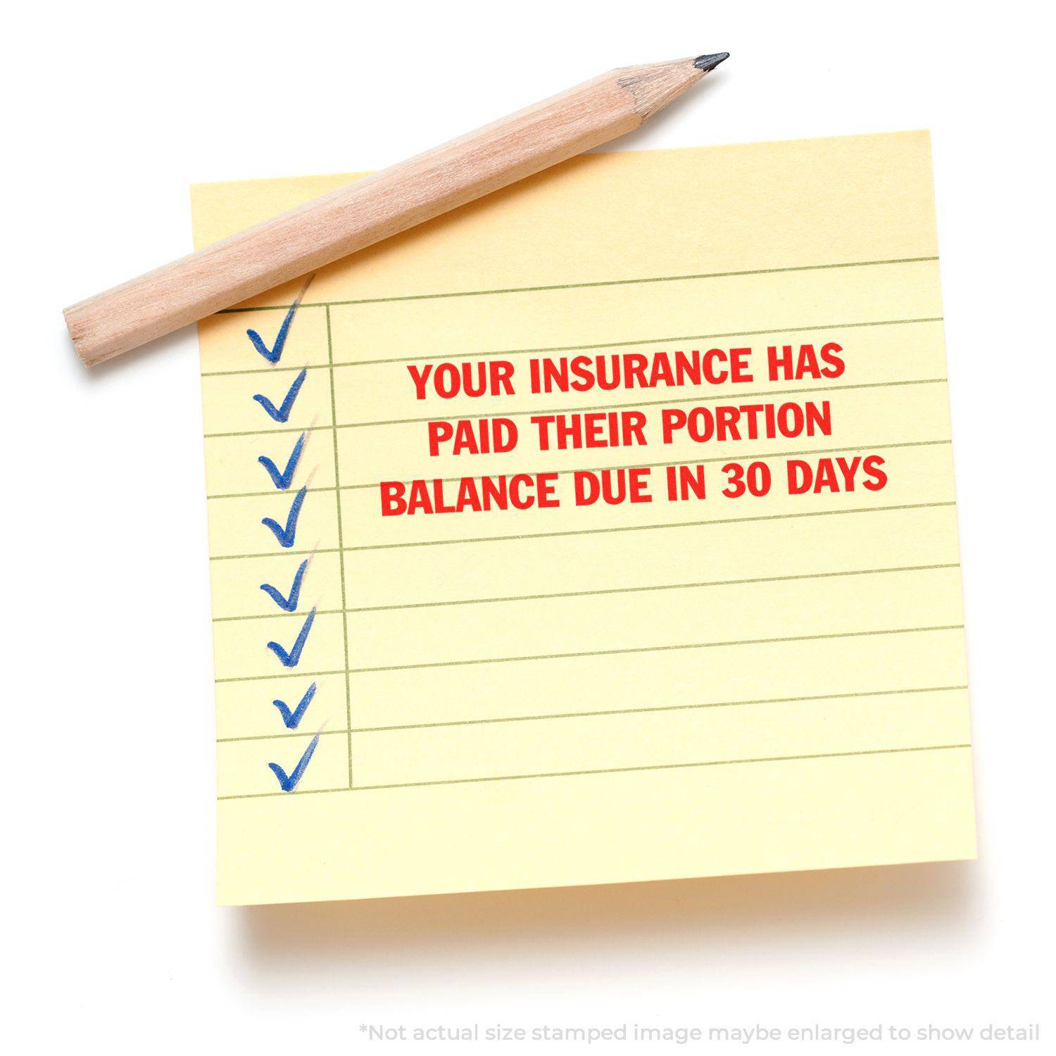 Yellow sticky note with blue checkmarks and red text stamped YOUR INSURANCE HAS PAID THEIR PORTION BALANCE DUE IN 30 DAYS using Large Pre-Inked Your Insurance Has Paid Their Portion Stamp.