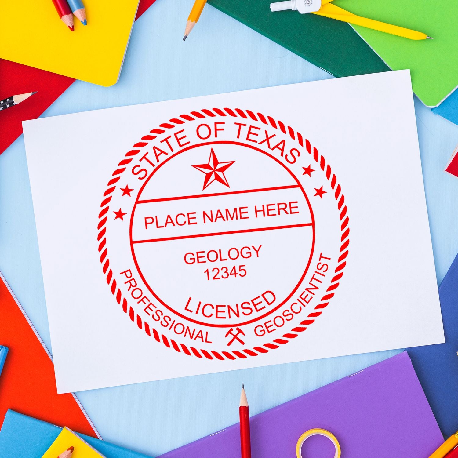 An in use photo of the Premium MaxLight Pre-Inked Texas Geology Stamp showing a sample imprint on a cardstock