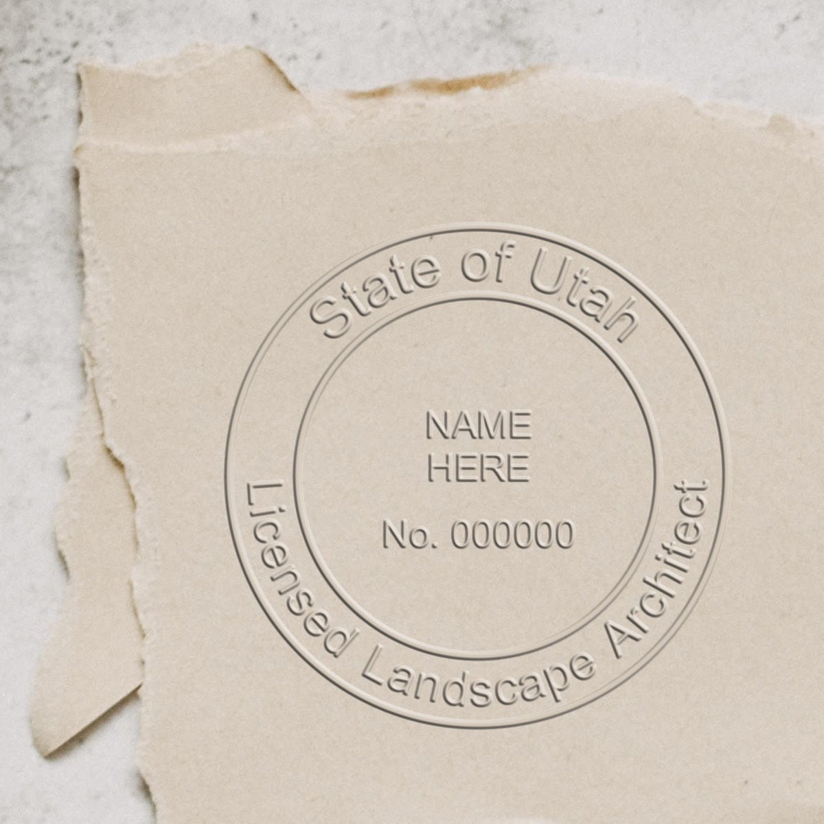 A stamped imprint of the Gift Utah Landscape Architect Seal in this stylish lifestyle photo, setting the tone for a unique and personalized product.