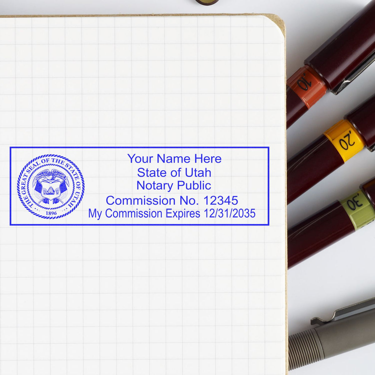 A stamped impression of the Super Slim Utah Notary Public Stamp in this stylish lifestyle photo, setting the tone for a unique and personalized product.