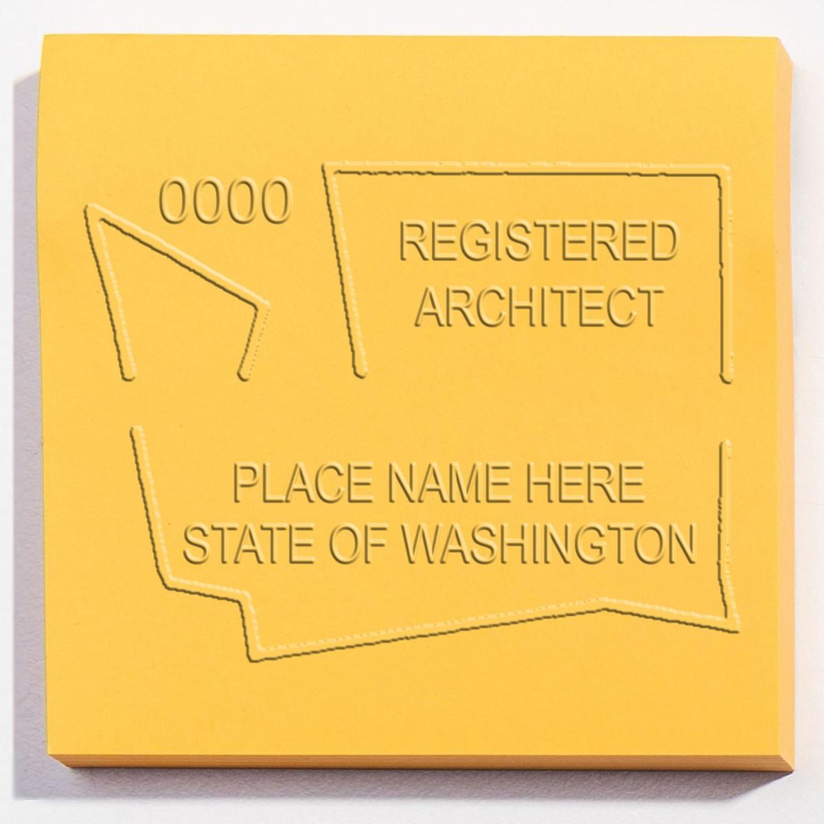 An alternative view of the State of Washington Long Reach Architectural Embossing Seal stamped on a sheet of paper showing the image in use