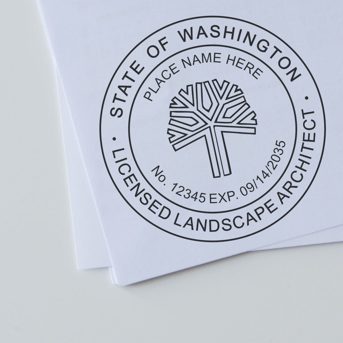 An alternative view of the Slim Pre-Inked Washington Landscape Architect Seal Stamp stamped on a sheet of paper showing the image in use