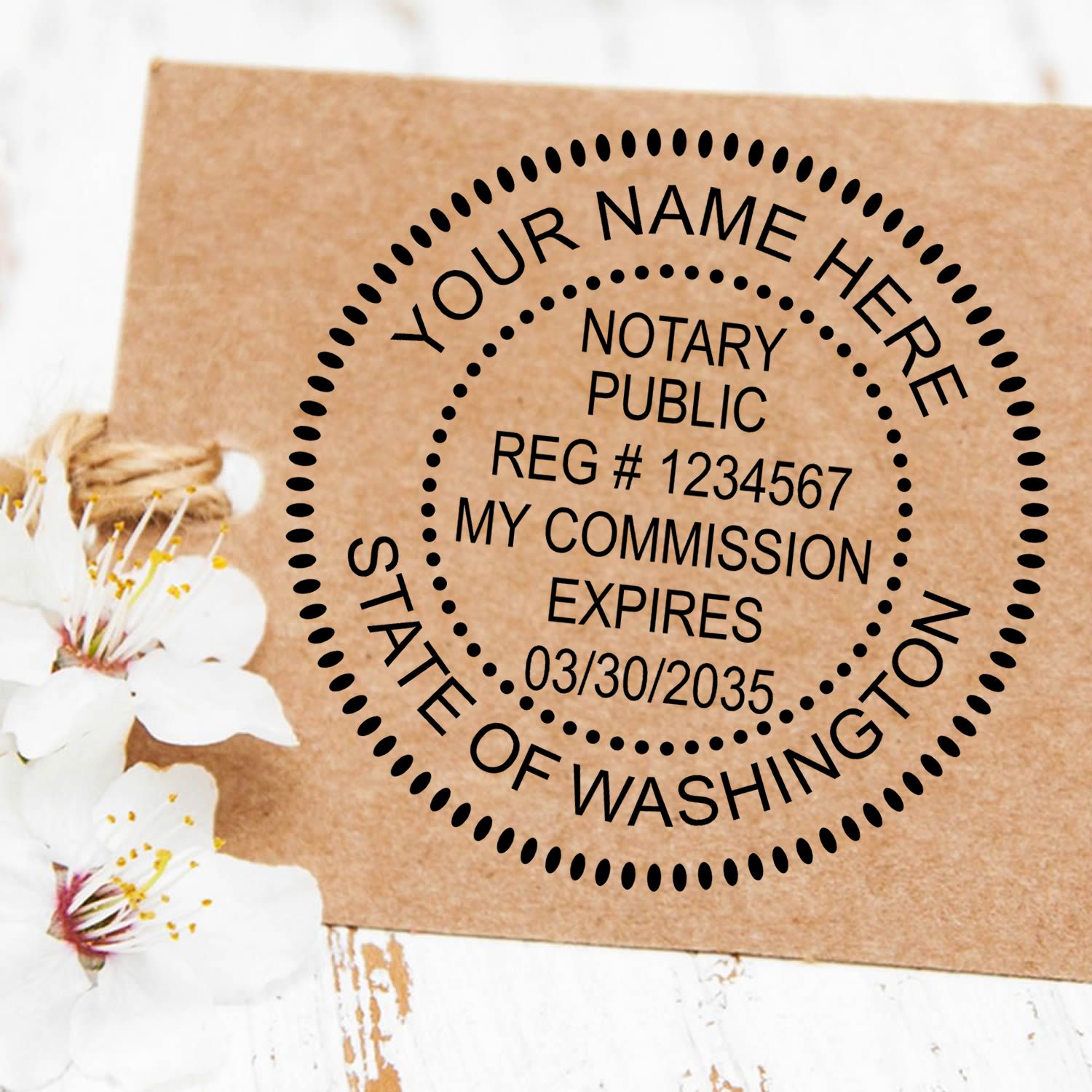 An alternative view of the Slim Pre-Inked Round Notary Stamp for Washington stamped on a sheet of paper showing the image in use