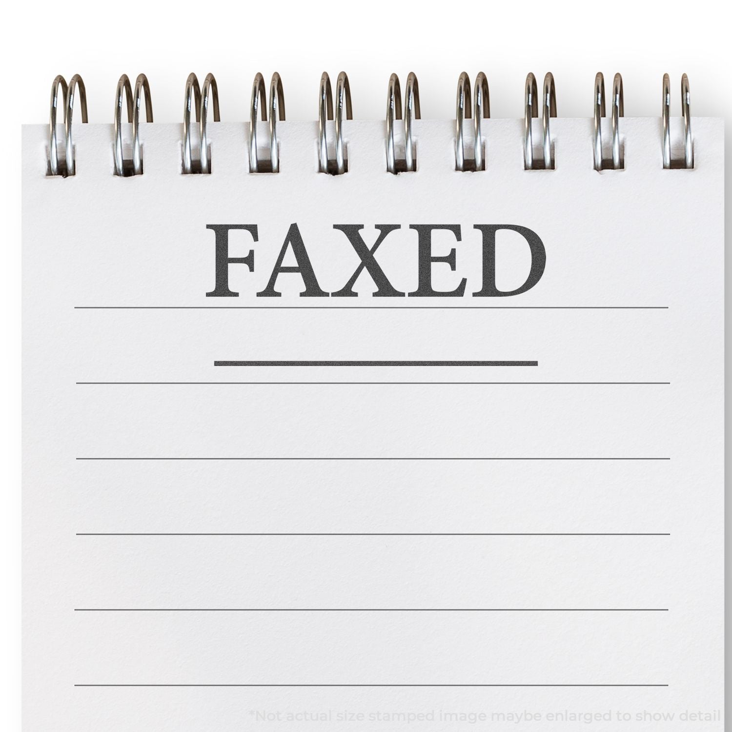 Slim Stamp 1444 Customized Pre-Inked Stamp 1/2 x 1-3/4 used on a notepad, displaying the word FAXED in bold letters.