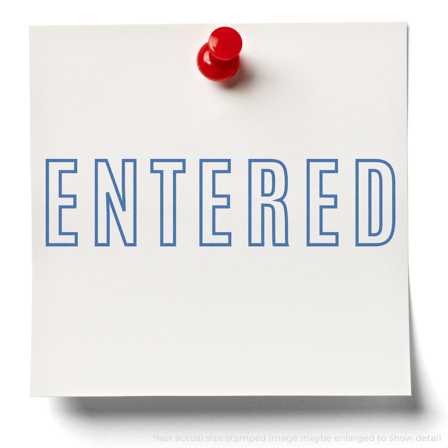 A white paper with the word ENTERED stamped in blue using the Blue Entered Xstamper Stamp, pinned with a red pushpin.