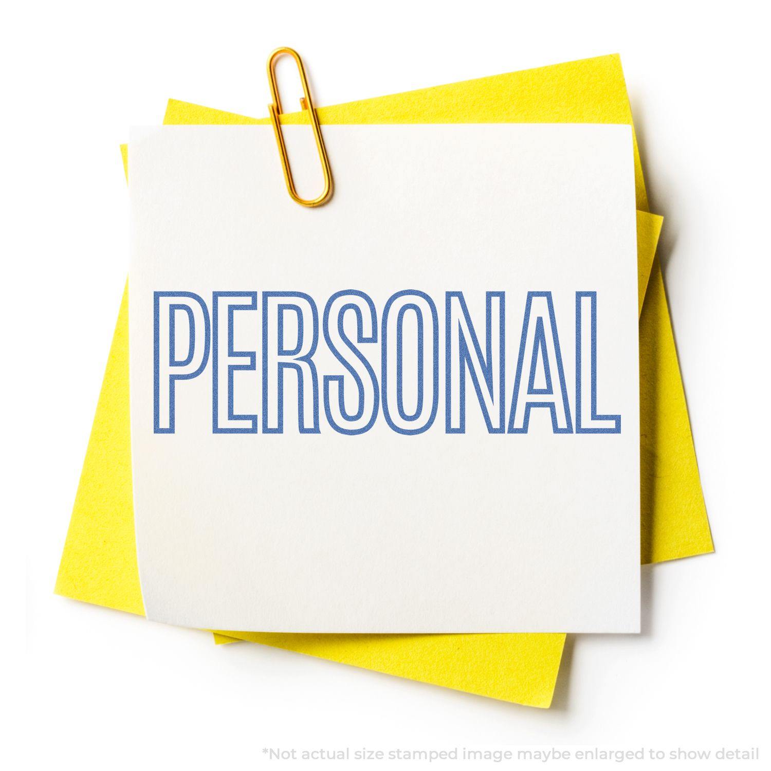 Blue Personal Xstamper Stamp imprinting the word PERSONAL on a white paper clipped to yellow sheets.