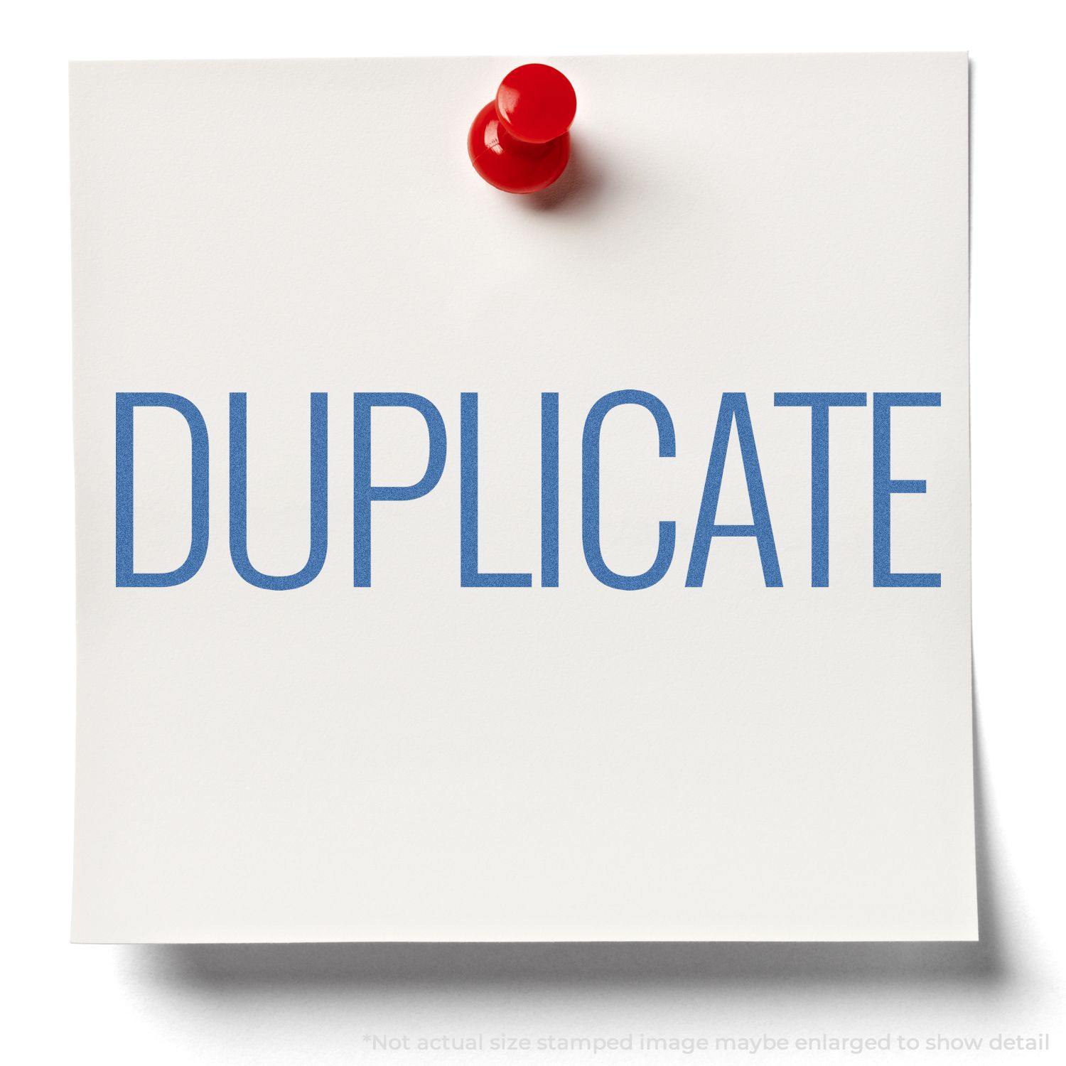 A red pushpin holds a white note with the word DUPLICATE stamped in blue using the Duplicate Xstamper Stamp.