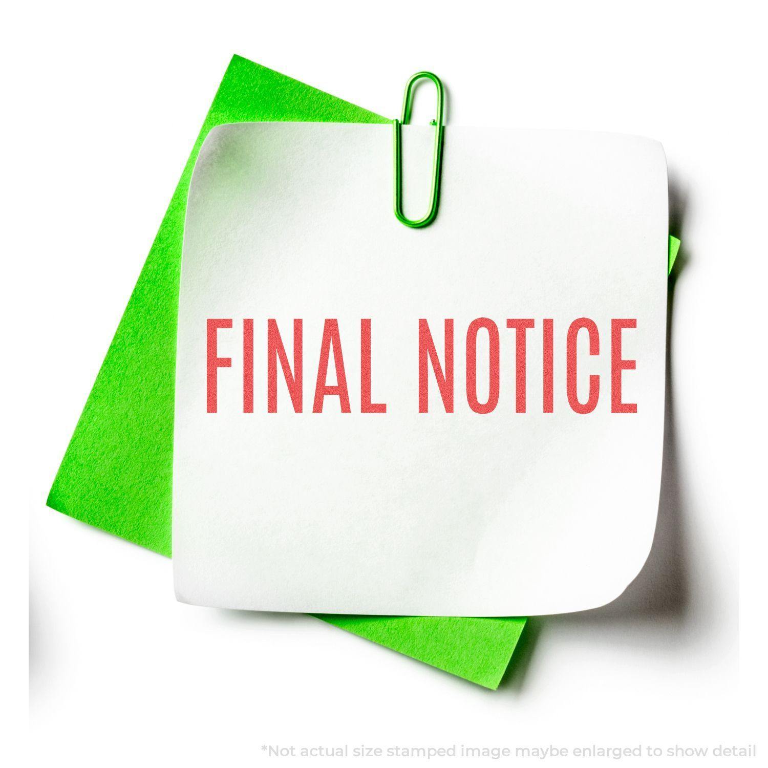 Final Notice Xstamper Stamp in use, stamping FINAL NOTICE in red on a white paper clipped to a green sheet.