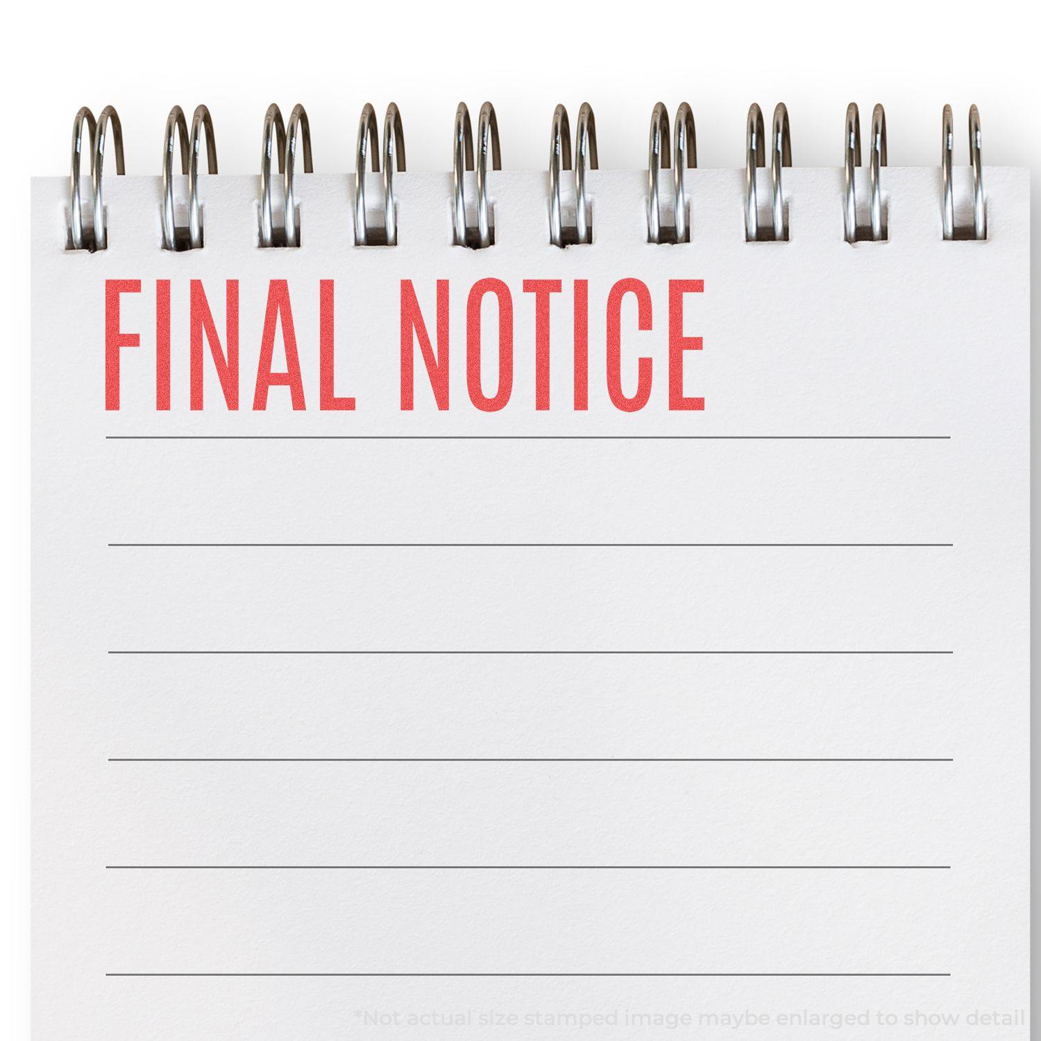 Final Notice Xstamper Stamp used on a spiral notebook, displaying the text 'FINAL NOTICE' in red on a lined page.