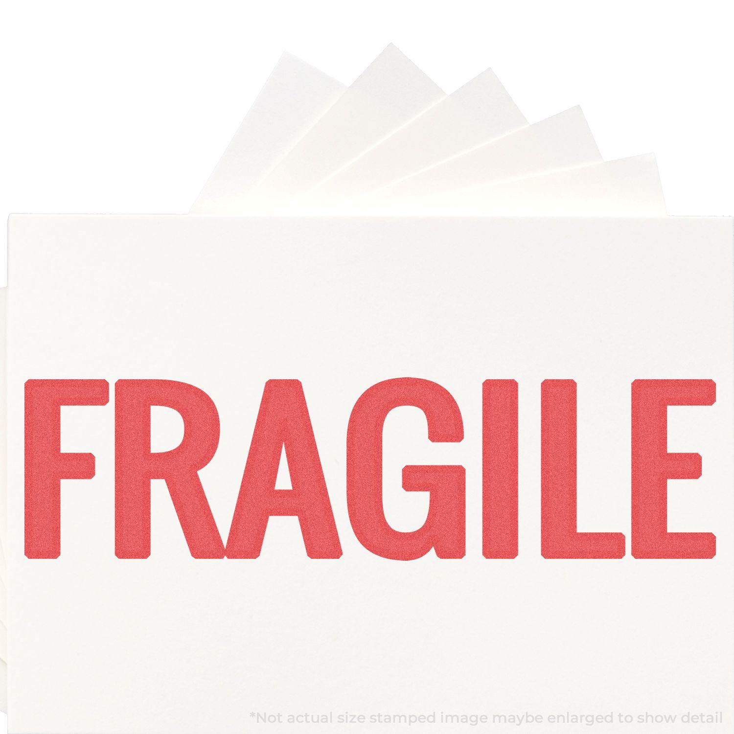 Jumbo Bold Red Fragile Xstamper Stamp imprinting the word FRAGILE in large red letters on a white surface.