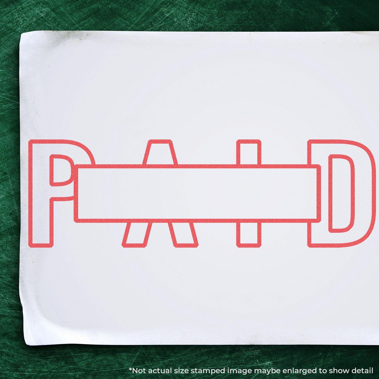 Image of a white paper stamped with the Jumbo Large Paid Xstamper Stamp in red ink, displaying the word PAID in large, bold letters.