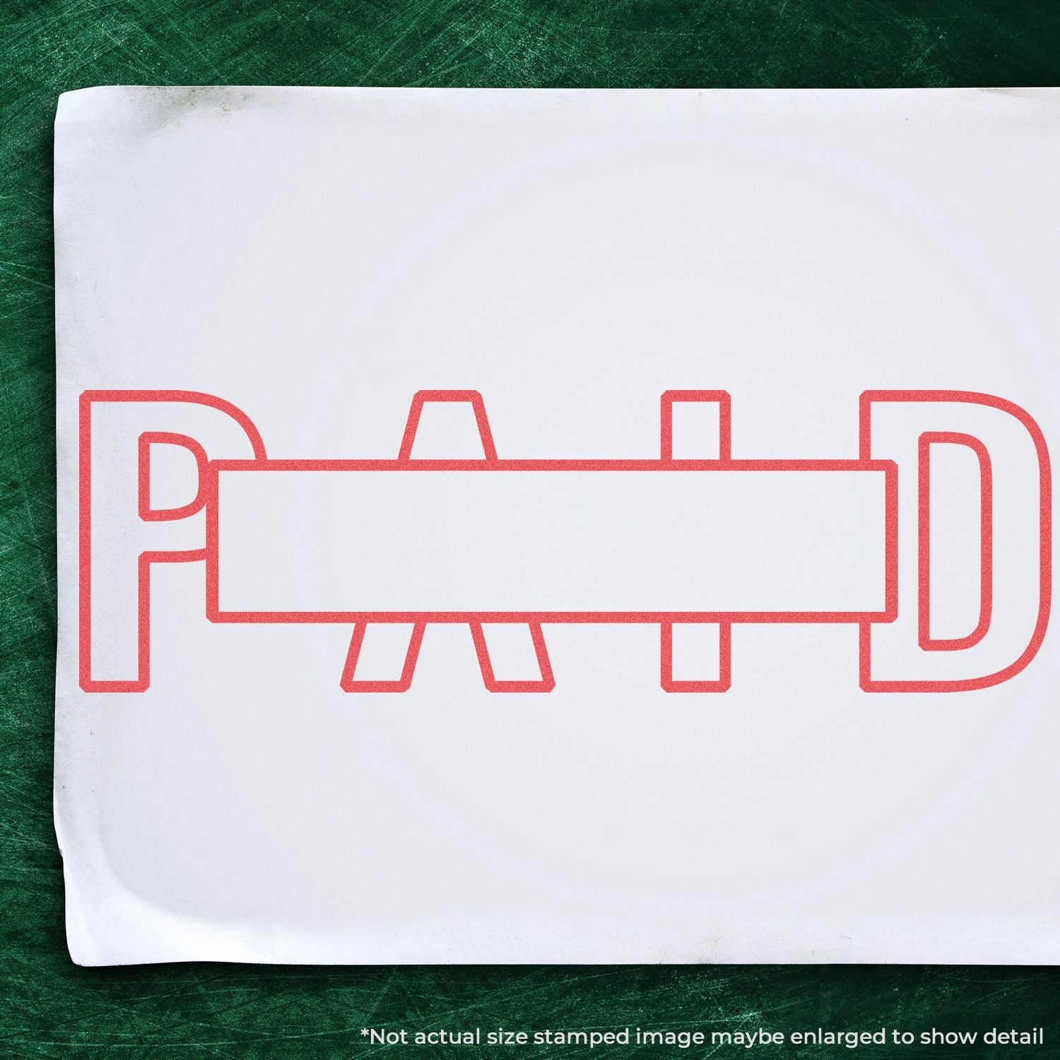 Custom Self Inking Stamp Trodat 4913 Size 7/8 x 2-3/8 used to stamp PAID in red ink on a white paper against a green background.