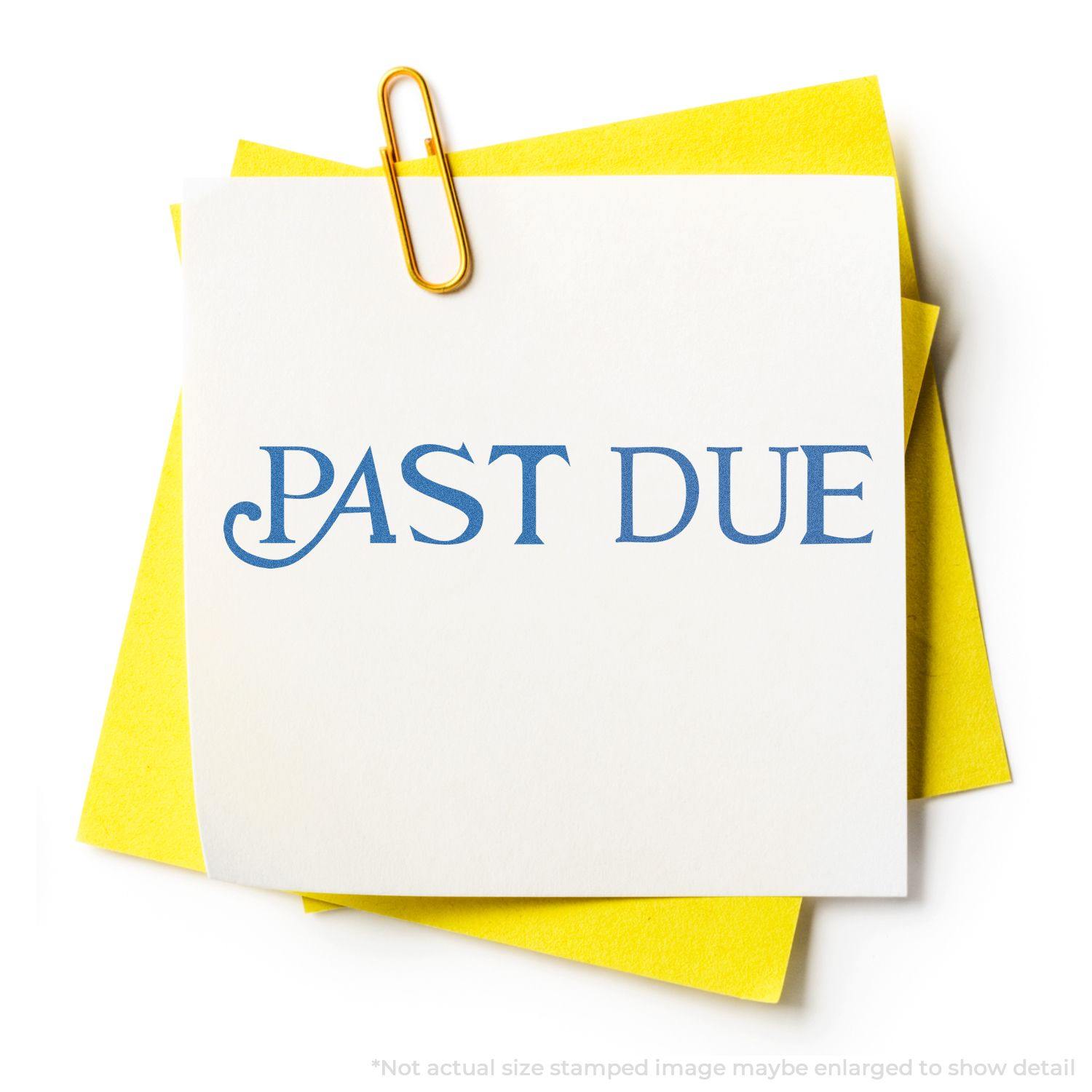 Yellow paper with a white note stamped Past Due in blue ink using the Past Due Xstamper Stamp, held by a gold paperclip.