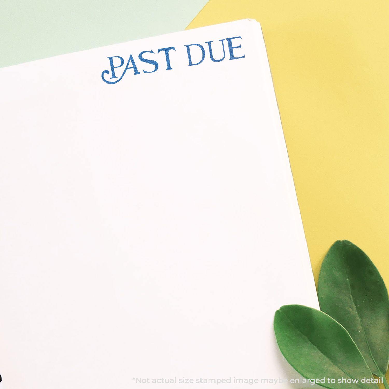 Past Due Xstamper Stamp used on a white paper, with green leaves and yellow background, showing the blue 'PAST DUE' text clearly.