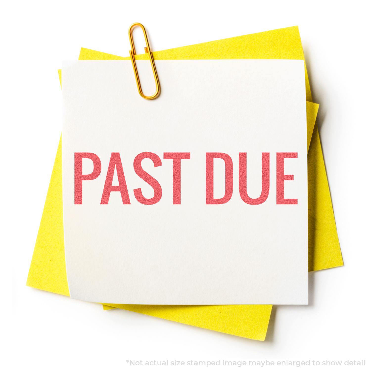 Red Past Due Xstamper Stamp marking PAST DUE on a white note with yellow paper underneath, held by a paperclip.