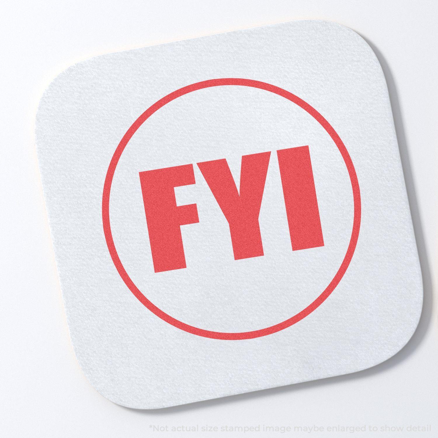 Round FYI Xstamper Stamp imprint in red on a white square paper, showing the bold FYI text inside a circle.