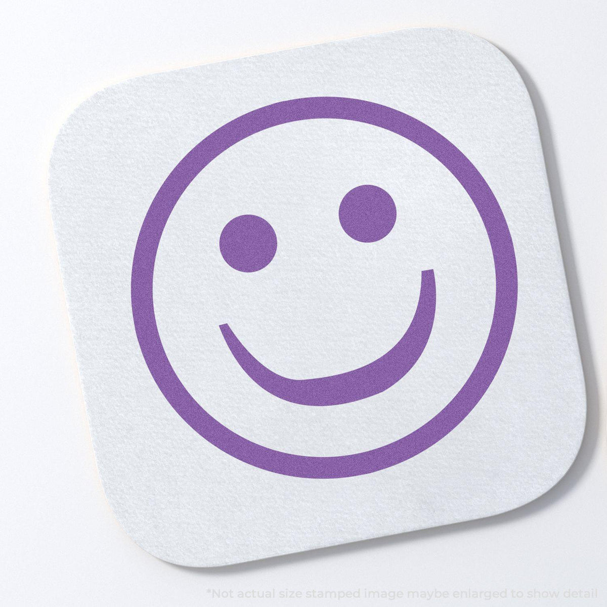 In Use Photo of Round Violet Smiley Face Xstamper Stamp