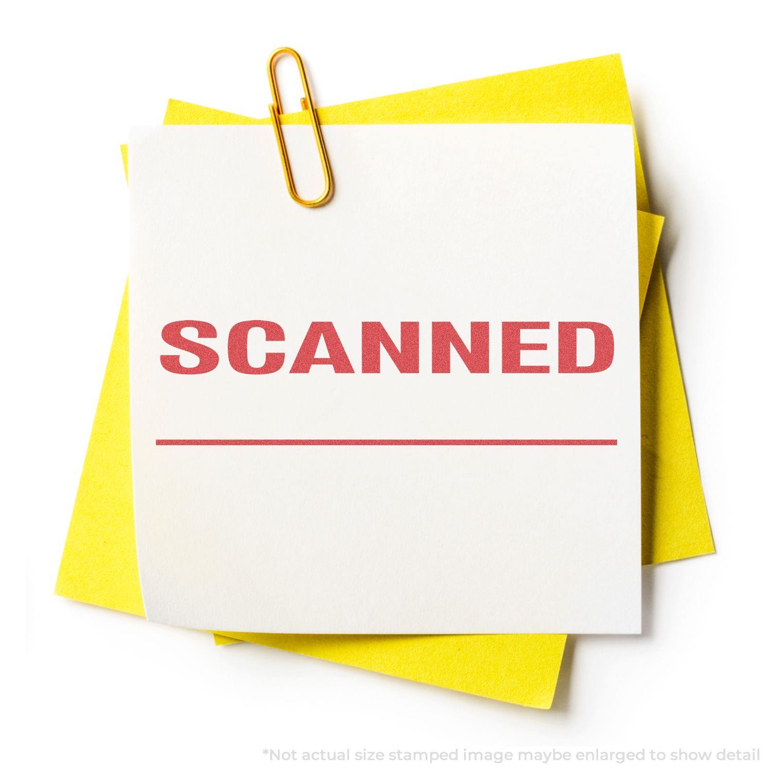 A Scanned Xstamper Stamp imprint on a white paper with a yellow background and a paperclip at the top.
