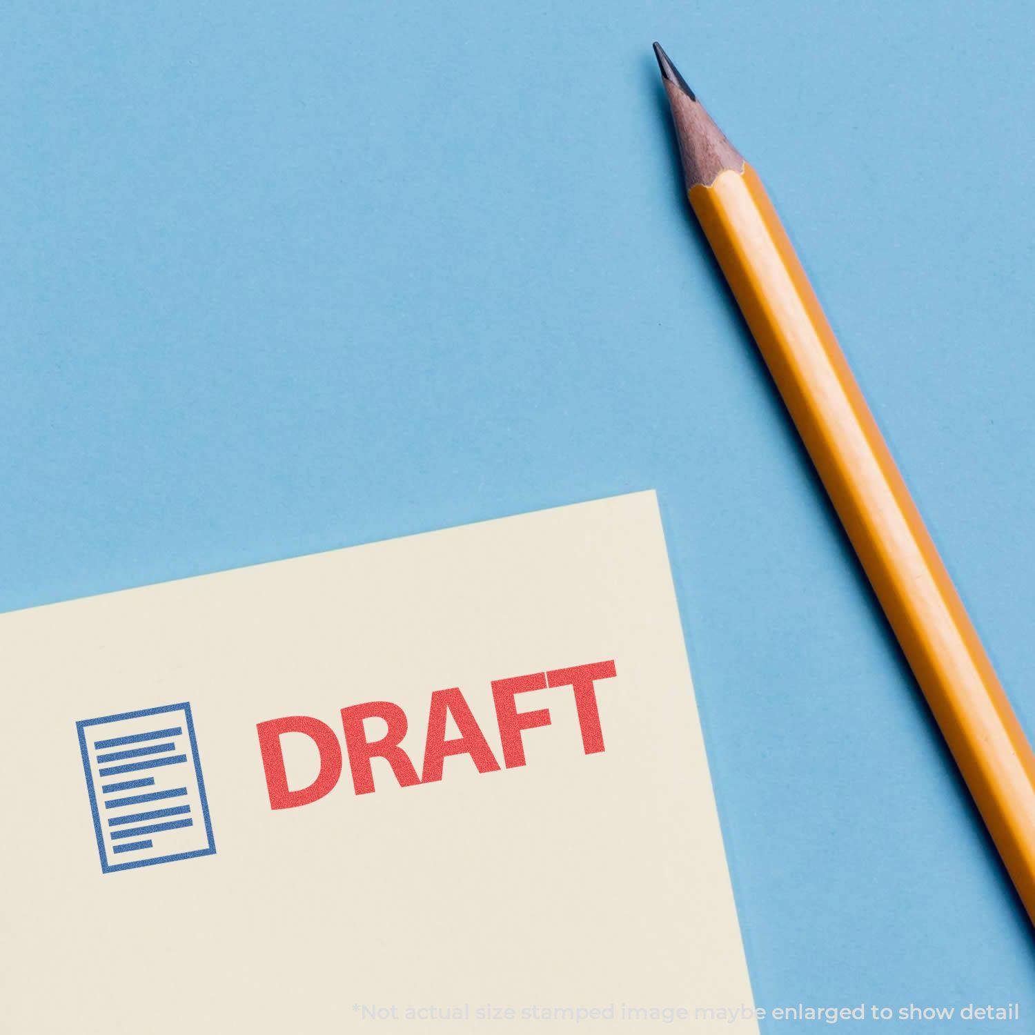 Two-Color Draft Xstamper Stamp in use on a document, with a yellow pencil placed beside it on a blue background.