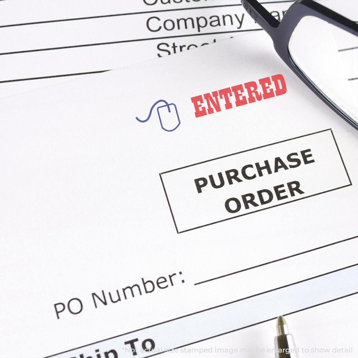 Two-Color Entered Xstamper Stamp used on a purchase order document, with the word ENTERED stamped in red and black ink.