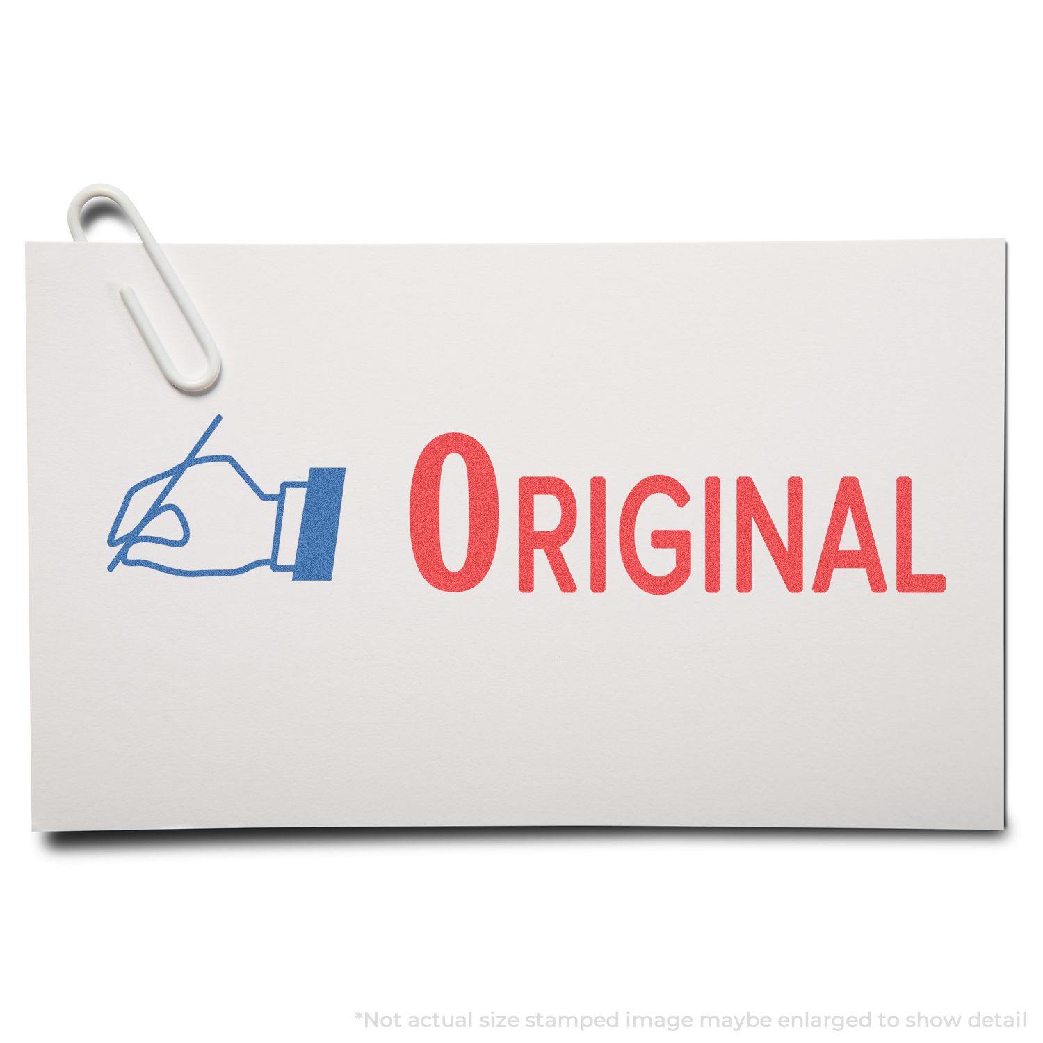 Two-Color Original Xstamper Stamp in use, showing a blue hand icon and the word ORIGINAL in red on a white card with a paperclip.