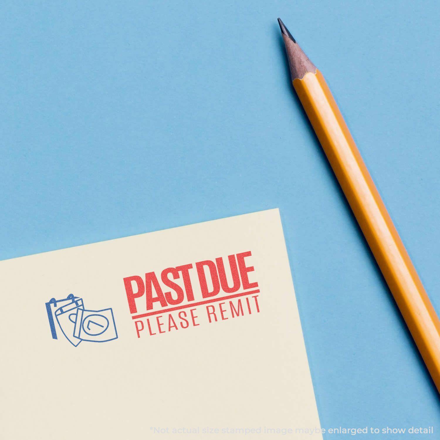 Two-Color Red Past Due Please Remit Xstamper Stamp used on a yellow paper next to a sharpened pencil on a blue background.