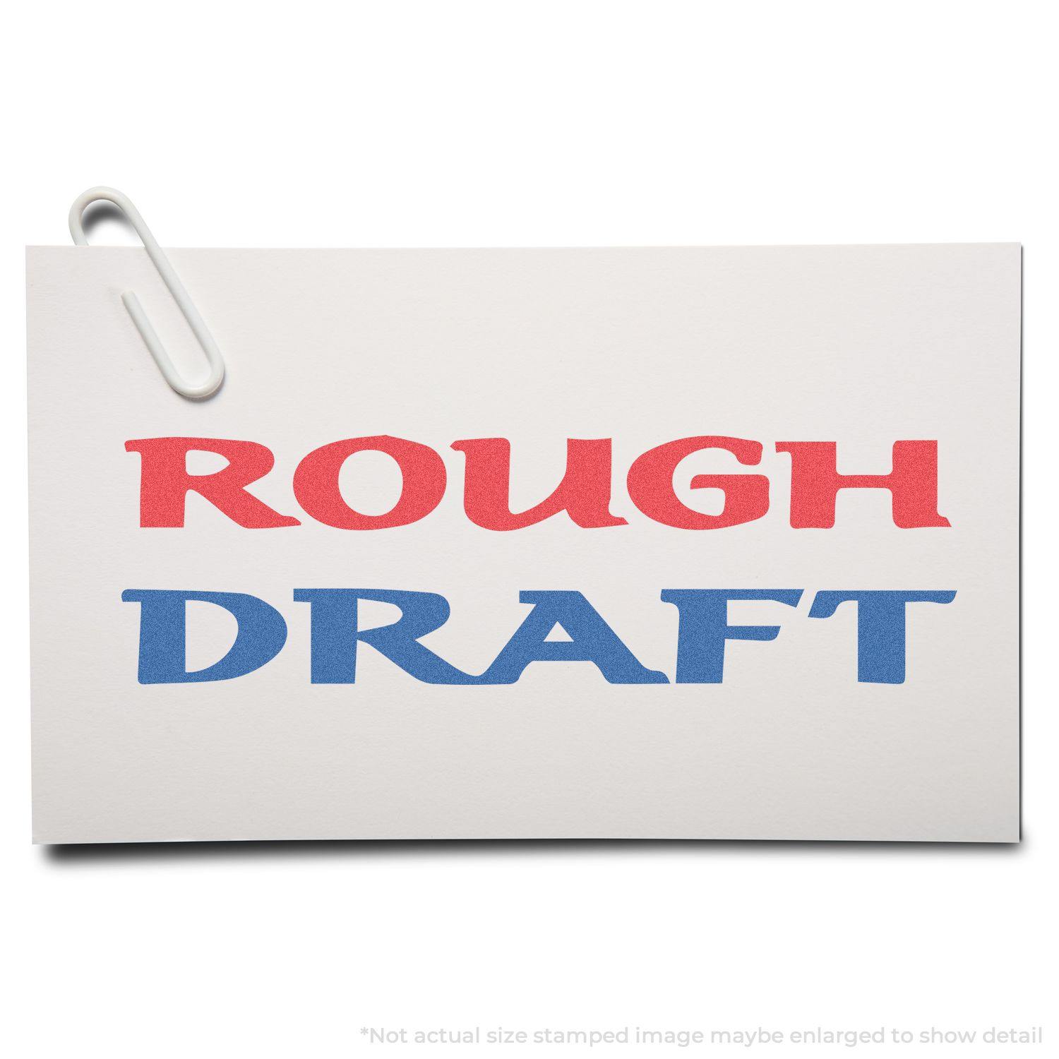 Two-Color Rough Draft Xstamper Stamp used on a white card with ROUGH DRAFT stamped in red and blue, clipped with a paperclip.