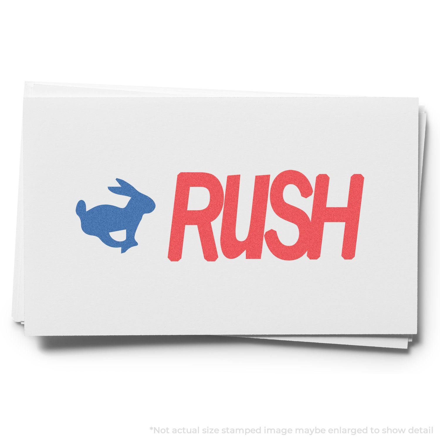 Two-Color Rush Xstamper Stamp in use, showing a blue rabbit icon and the word RUSH in red on a white card.