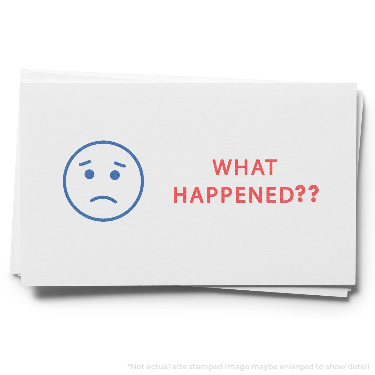 Two-Color What Happened? Xstamper Stamp imprint on white paper, featuring a blue sad face and red text asking WHAT HAPPENED?? .