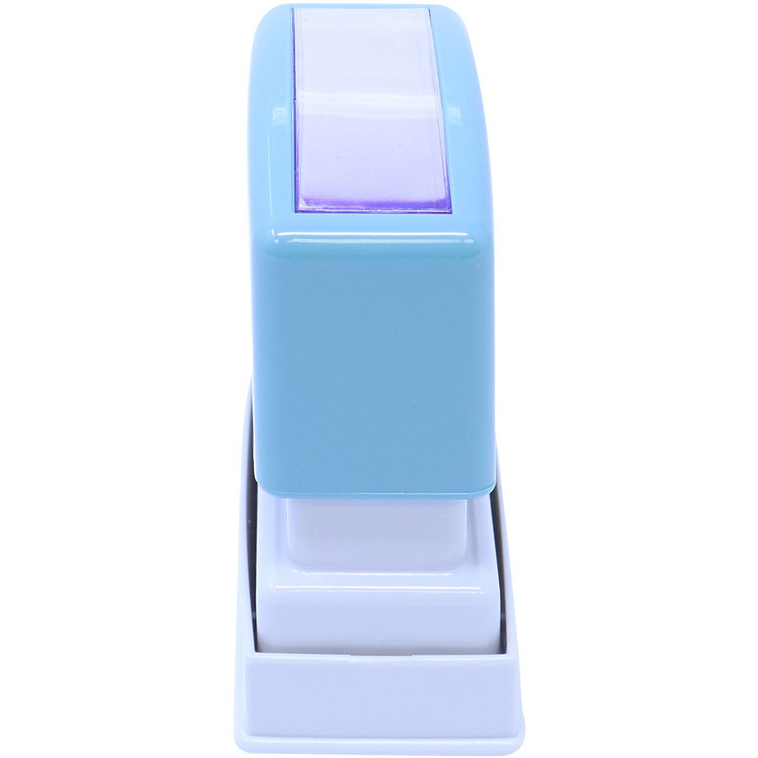 Blue and white Red File Xstamper Stamp with a rectangular design, shown from the side view, placed on a white background.