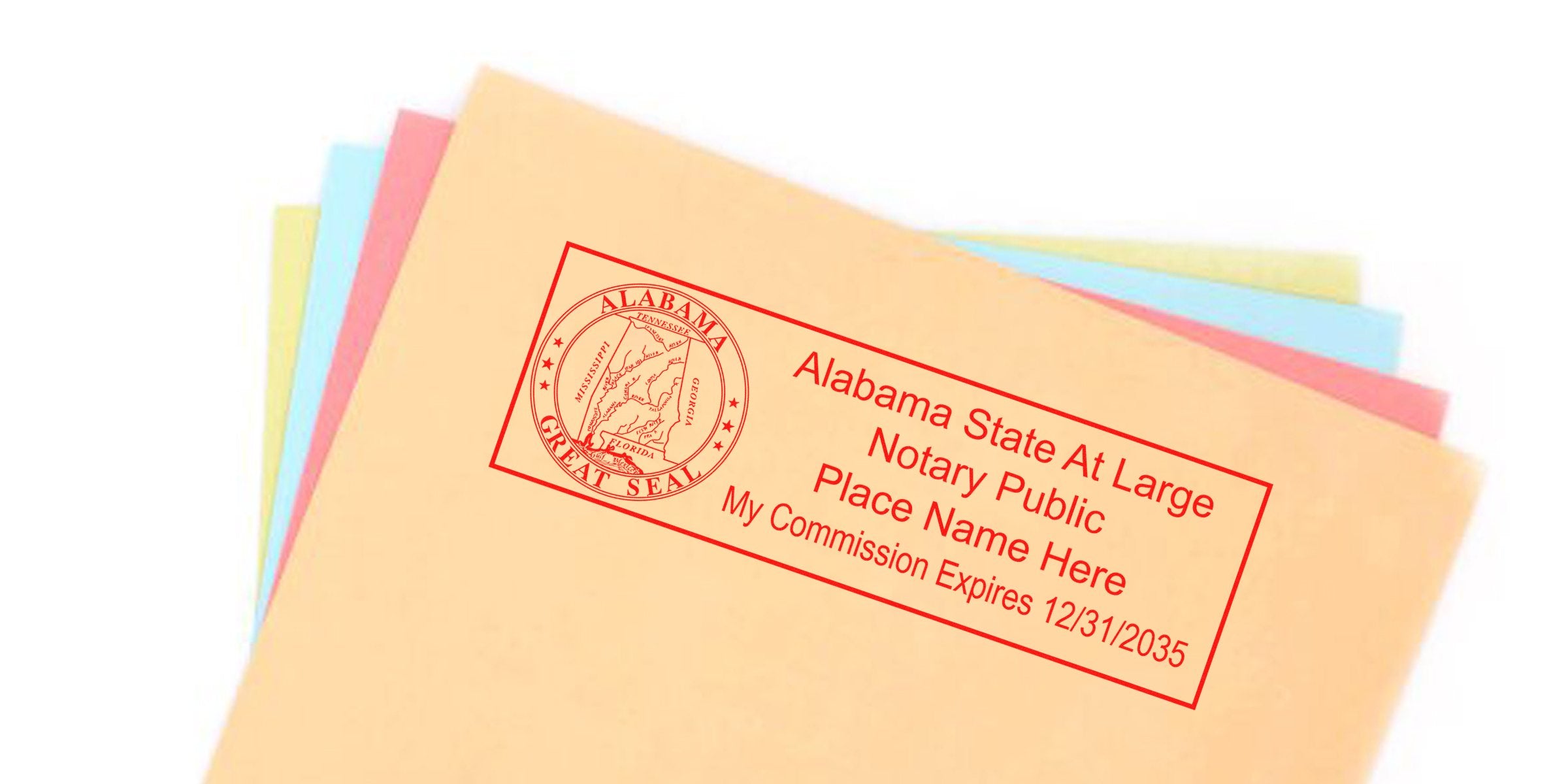 Stack of pastel manila file folders with a red Alabama notary public rubber stamp imprint showing the state seal and sample commission text and expiration date.