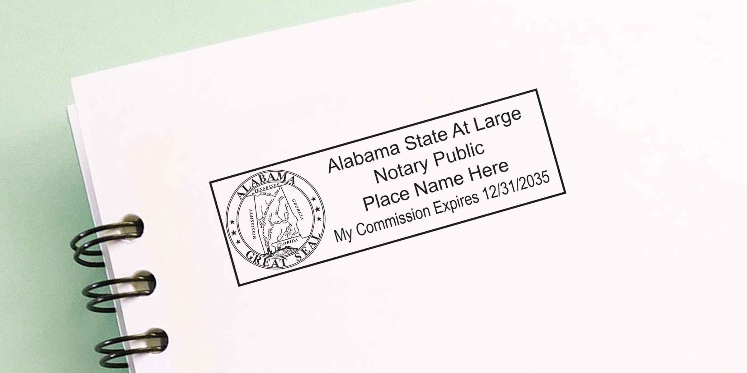 Alabama notary public stamp imprint with Great Seal, placeholder name and commission expiration 12/31/2035 on white spiral-bound notebook page — notary stamp, Alabama seal.