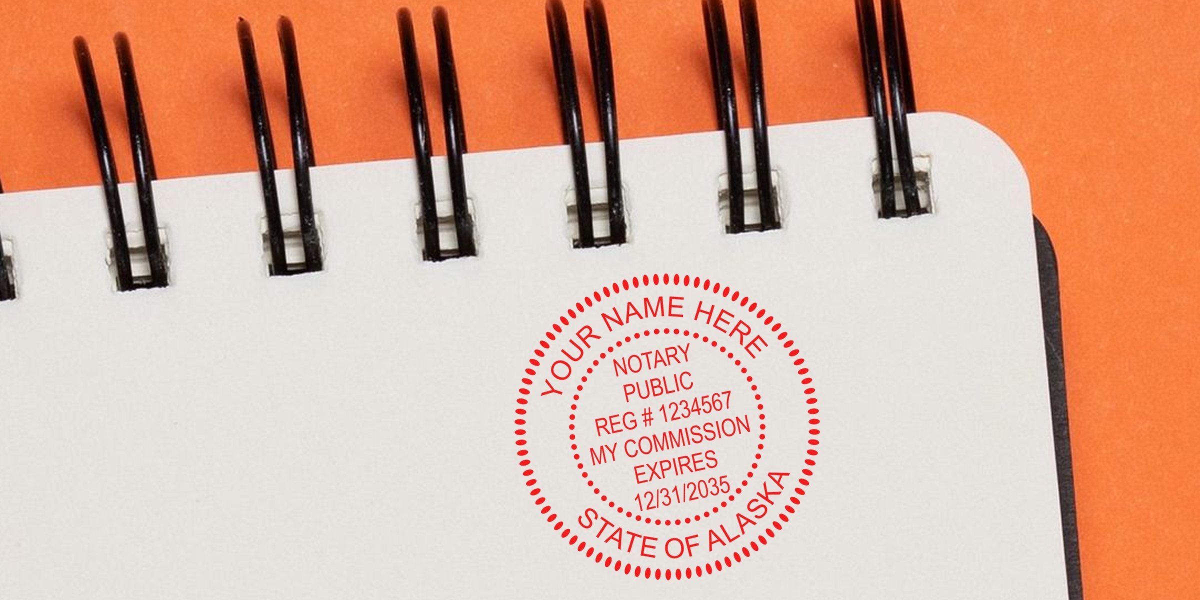 Red circular notary public stamp reading "Your Name Here, Notary Public, Reg #1234567, My Commission Expires 12/31/2035, State of Alaska" stamped on a white spiral notebook page with an orange background
