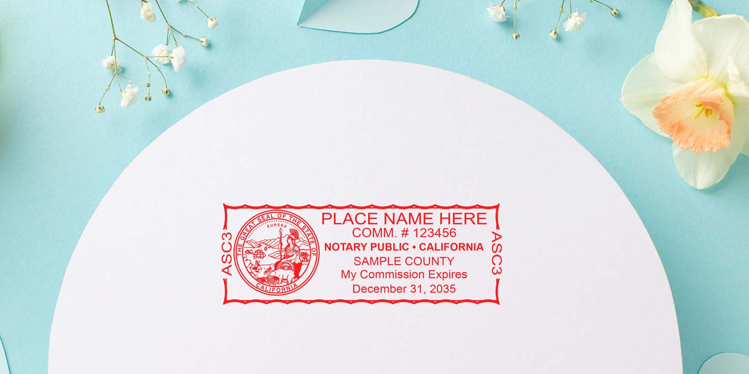 Red California notary public stamp on white circular paper showing state seal, commission number, sample county and expiration date, placed on pastel blue background with white and peach flowers for decorative stationery photo